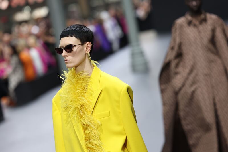 Feathering details at Valentino, such as this trimmed jacket, for spring/summer 2023. Getty 