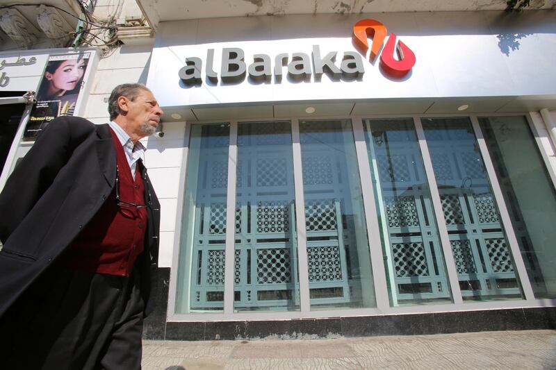 A man walks past a branch of Al Baraka Bank in Algiers city, Algeria April 5, 2017.   REUTERS/Ramzi Boudina