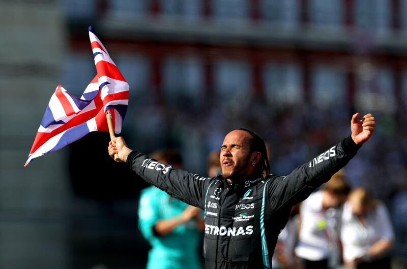 Mercedes' Lewis Hamilton celebrates after winning the British Grand Prix at Silverstone on Sunday, July 18.