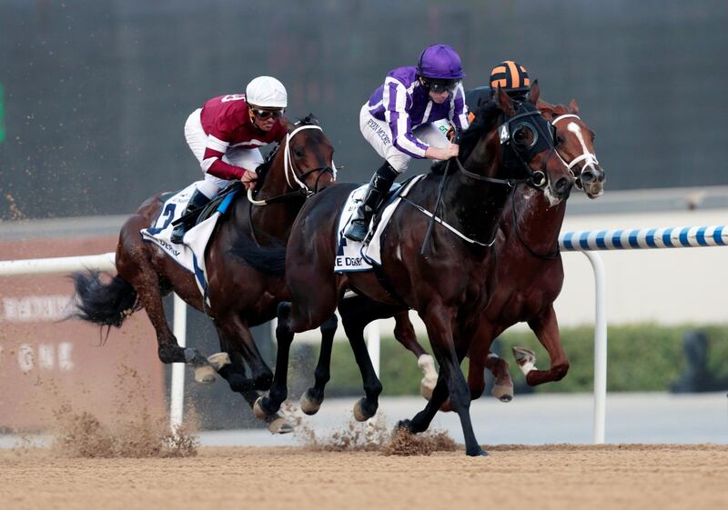 Ryan Moore rides Mendelssohn to victory in the UAE Derby. Christopher Pike / Reuters