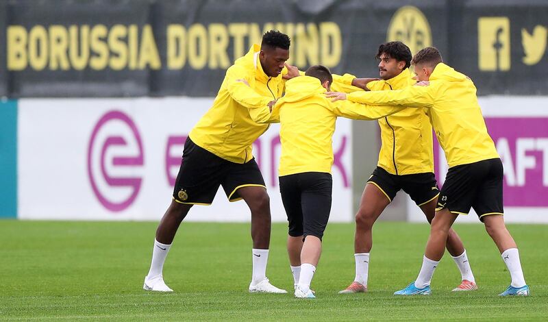 epa07847014 Dortmund players (L-R) Dan-Axel Zagadou, Raphael Guerreiro, Mahmoud Dahoud, and Thorgan Hazard attend their team's training session in Dortmund, Germany, 16 September 2019. Borussia Dortmund will face FC Barcelona in their UEFA Champions League group F soccer match on 17 September 2019.  EPA/FRIEDEMANN VOGEL