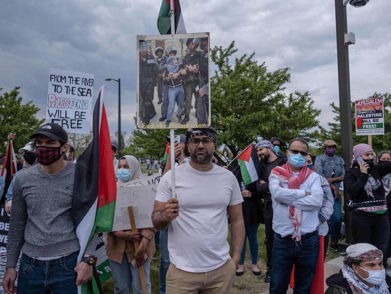 Hundreds of residents of Dearborn, Michigan, gather outside the city's police department to protest against the actions of the Israeli Army in Gaza and the expulsion of Palestinian families from Sheikh Jarrah in East Jerusalem. AFP