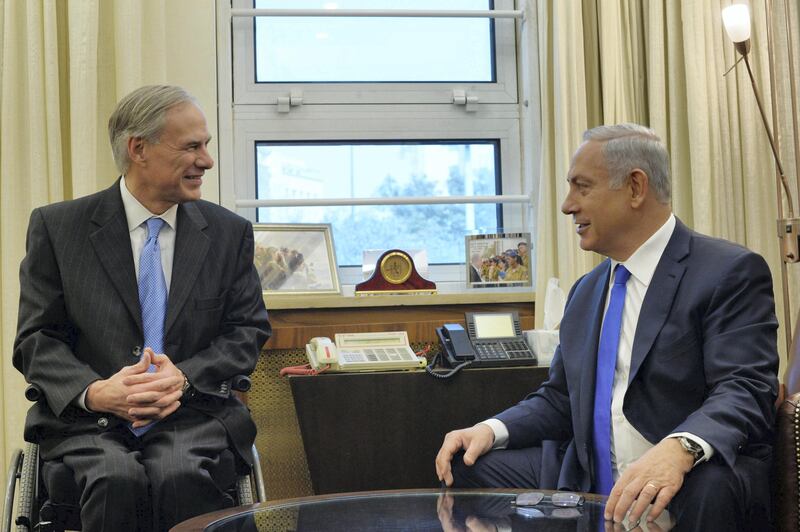 JERUSLEM, ISRAEL - JANUARY 18: (ISRAEL OUT) In this handout image provided by the Israeli Government Press office (GPO), Prime Minister Benjamin Netanyahu meets with Gregory Wayne Abbott, Governor of Texas at his office on January 18, 2016 in Jerusalem, Israel.  (Photo by Kobi Gideon / GPO via Getty Images)