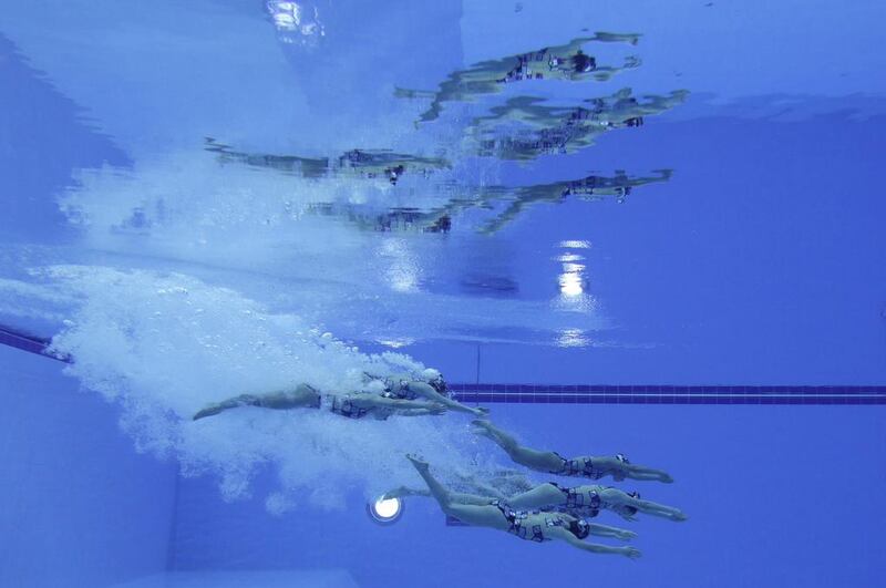 Japanese synchronised swimming team perform their technical routine at the Asian Games on Sunday in Incheon, South Korea. Lee Jin-man / AP