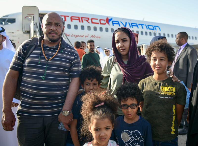 Emad Abbas and Sarah Ahmed with their four children, aged between four and 12 

