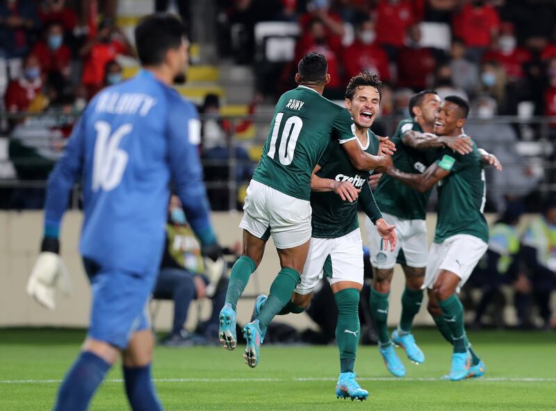Raphael Veiga celebrates scoring for Palmeiras.