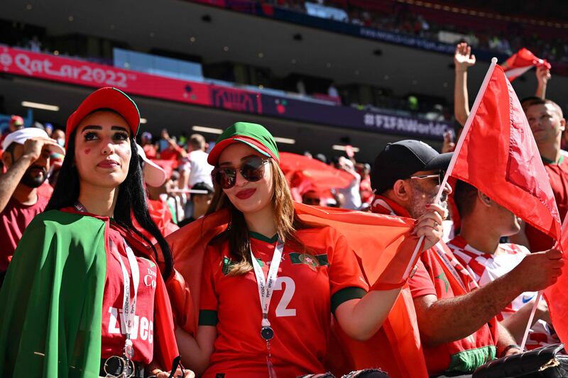 Morocco supporters draped in their country's flag ahead of the Croatia game. AFP