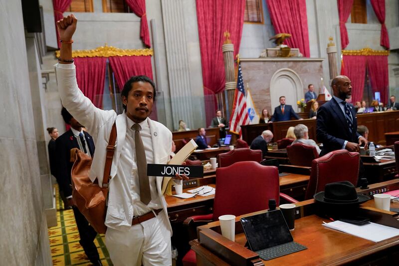 Justin Jones carries his name tag after he was expelled from the Tennessee House of Representatives for his role in a gun control demonstration. Reuters