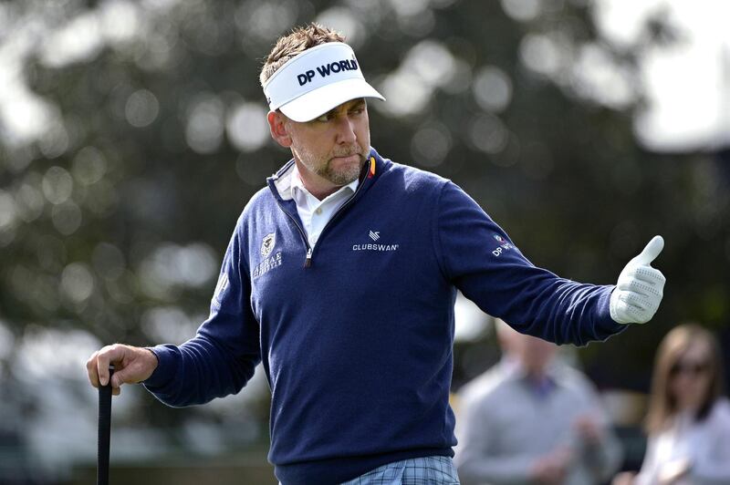 Ian Poulter, of England, acknowledges a well-wisher after hitting his tee shot on the first hole during the final round of the Arnold Palmer Invitational golf tournament, Sunday, March 8, 2020, in Orlando, Fla. (AP Photo/Phelan M. Ebenhack)