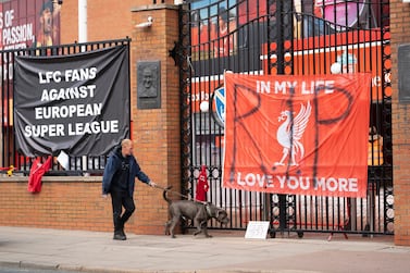 Banners protesting against the proposed European Super League outside Liverpool's Anfield stadium. PA