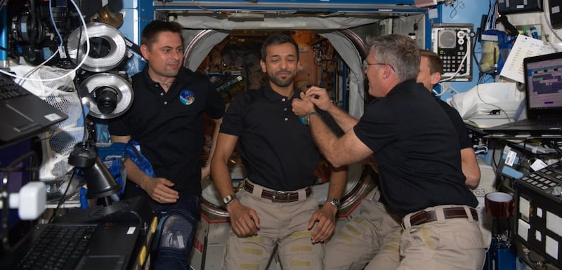 Sultan Al Neyadi receives the golden astronaut pin from his crewmates. Photo: Sultan Al Neyadi / Twitter
