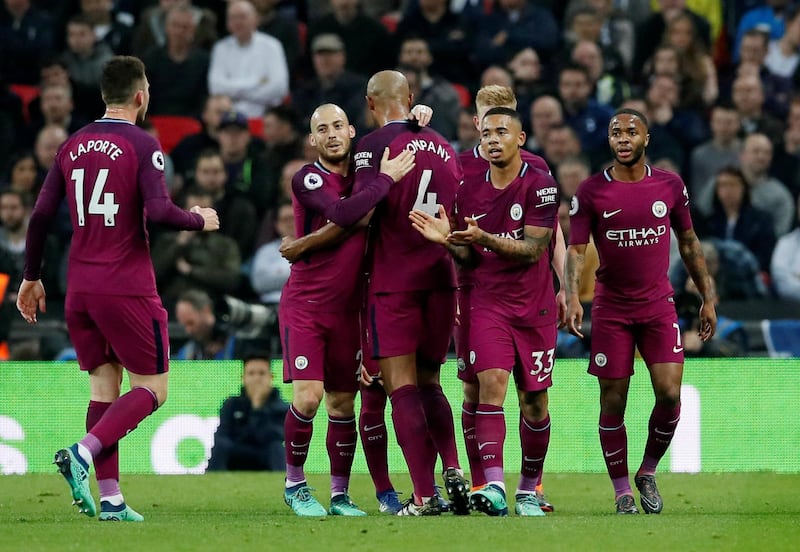 Manchester City's Gabriel Jesus celebrates with teammates scoring their first goal. David Klein / Reuters