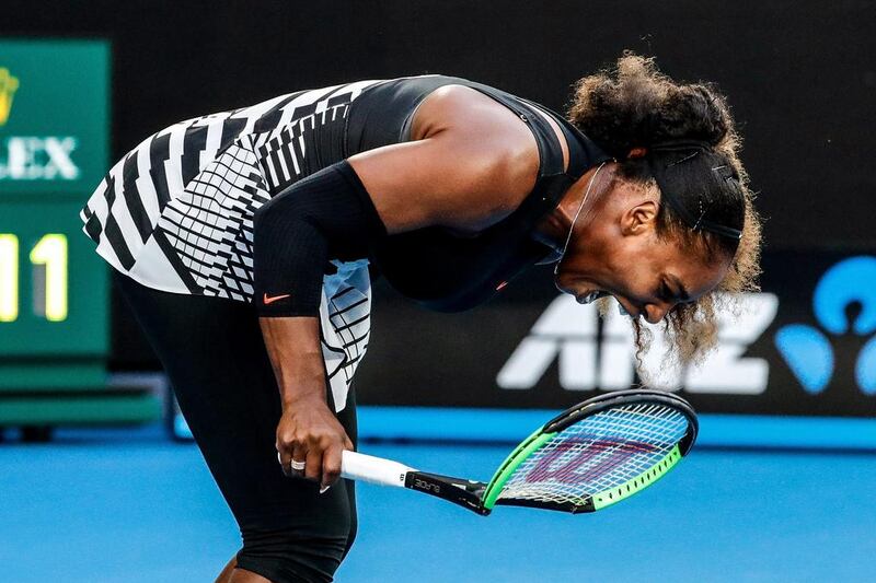 Serena Williams smashes her racket during the Australian Open final. Made Nagi / EPA