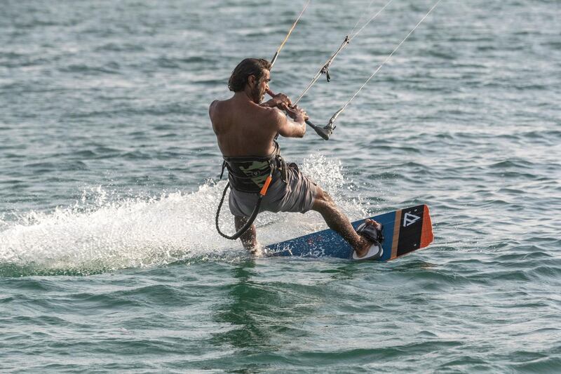 DUBAI, UNITED ARAB EMIRATES. 12 OCTOBER 2020. UAE kitesurfing champion Mohammed Al Mansoori. Mohammed got into the sport after falling in a coma from a biking accident which also broke both his legs and meant that he couldn't walk for years. As the captain of the UAE kitesurfing club, he calls
for more Emiratis to join the sport so it could grow in the region and they could have a GCC league. (Photo: Antonie Robertson/The National) Journalist: Haneed Dajani. Section: National.
