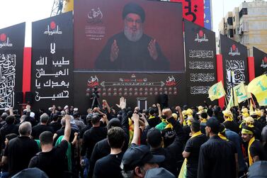 Lebanon's Hezbollah leader Hassan Nasrallah gestures as he addresses his supporters via a screen. Reuters, file