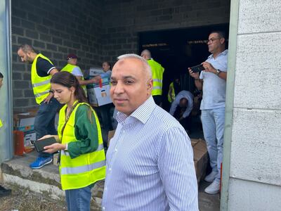 Ridouane Chahid, mayor of Evere, at the opening of a donation centre in Anderlecht, Belgium. Sunniva Rose / The National