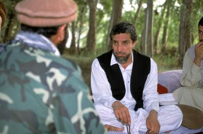392910 18: FILE PHOTO: (NEWSWEEK, US NEWS & WORLD REPORT OUT) Afghan opposition leader General Ahmad Shah Massoud (R) meets with his advisors at one of his headquarters in Khwaja Bahauddin June 2001, Takhar Province, Afghanistan. Massoud was fatally wounded in a suicide bombing at one of his headquarters on September 9, 2001. His death was not confirmed until September 13, 2001.  (Photo by Robert Nickelsberg/Getty Images)