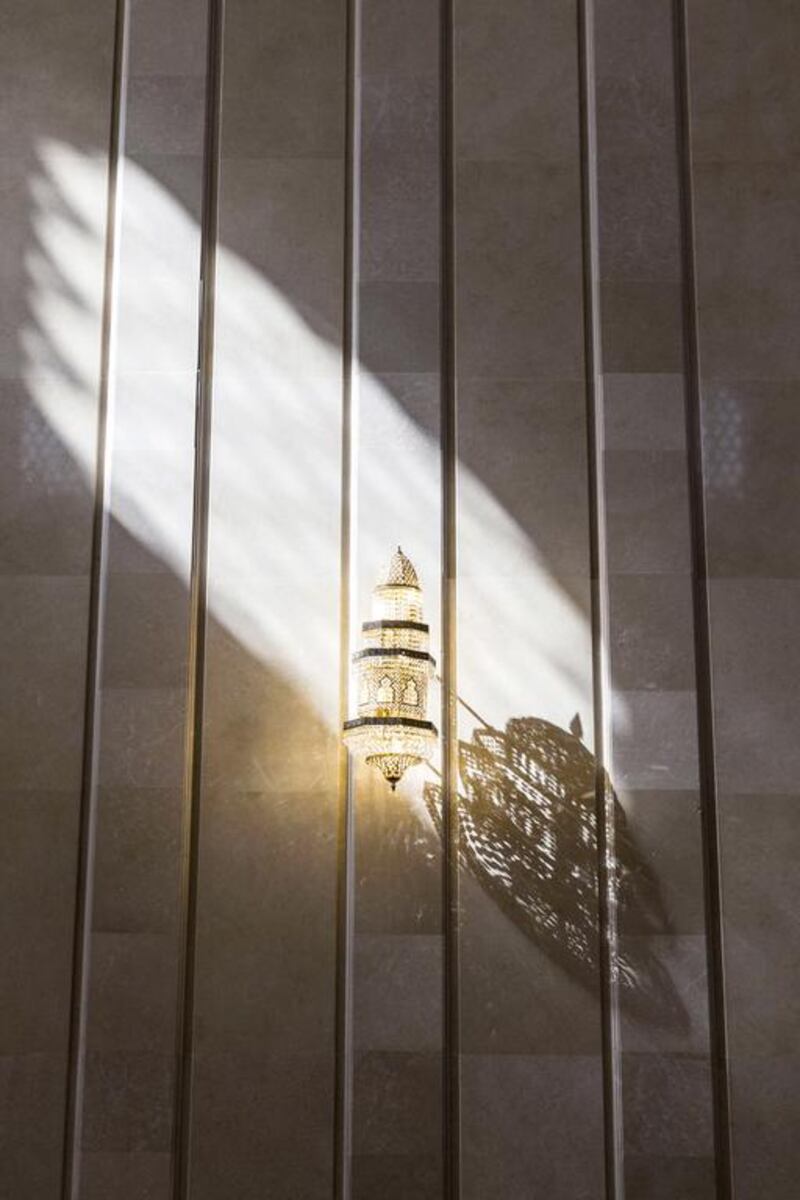 Sunlight shines on the walls of Sheikh Zayed Mosque. Reem Mohammed / The National