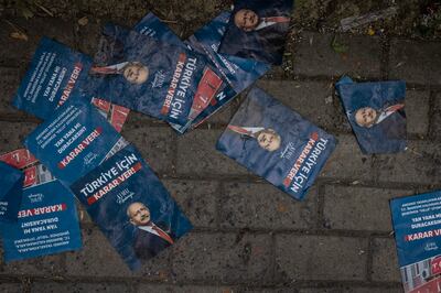 Flyers for opposition leader Kemal Kilicdaroglu are scattered on the ground near a poling station in Istanbul.  Although Mr Kilicdaroglu won nearly 48 per cent of the vote, it was not enough to unseat President Recep Tayyip Erdogan in the run-off election. Getty