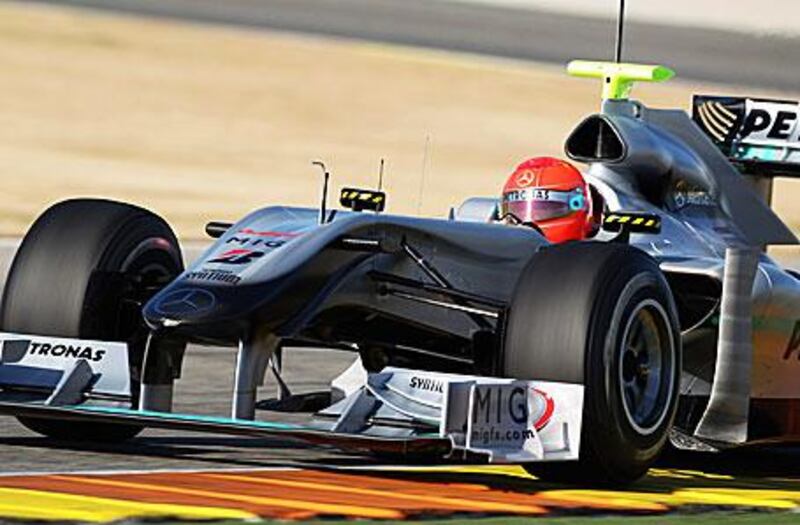 Michael Schumacher test drives a Mercedes GP car in Valencia, Spain, yesterday. It was his first time in a Formula One car since coming out of retirement.