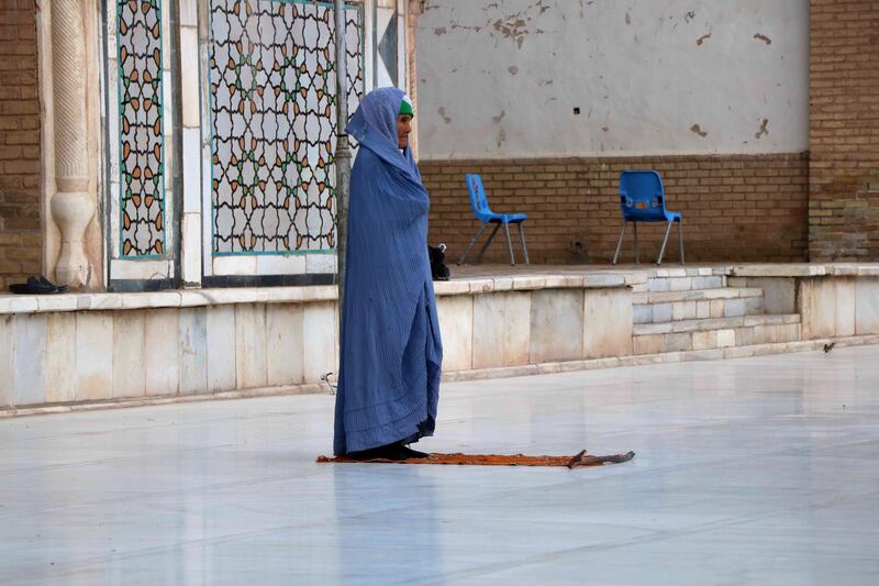 A woman prays at a mosque during the Muslim holy month of Ramadan in Herat, Afghanistan.  EPA