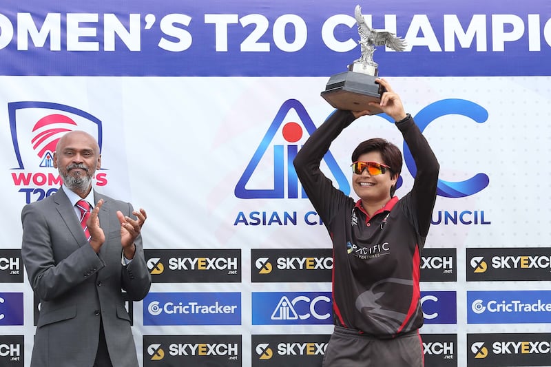 Chaya Mughal, the UAE captain, raises the ACC Women's T20 Championship trophy in Kuala Lumpur. Photo: Malaysia Cricket Association