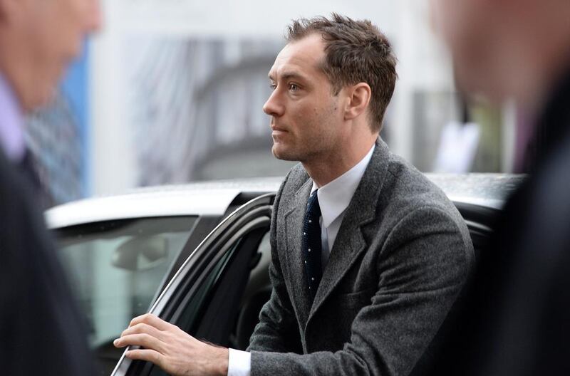 Jude Law arrives at the Old Bailey in London to give evidence in the News of the World hacking trial. Andy Rain / EPA