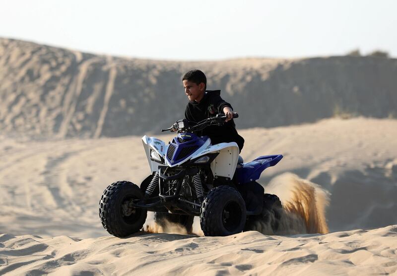 Dubai, United Arab Emirates - December 01, 2019: People head into the desert to enjoy the bank holiday on the 48th national day weekend. Sunday, December 1st, 2019. Desert, Dubai. Chris Whiteoak / The National