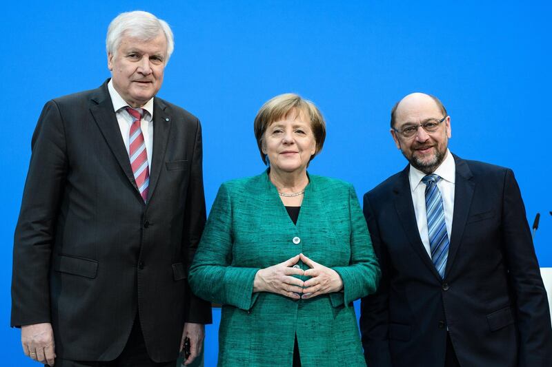 epa06502975 (L-R) Minister President of Bavaria Horst Seehofer of the Christian Social Union (CSU), German Chancellor Angela Merkel of the Christian Democratic Union (CDU) and Leader of the Social Democratic Party (SPD) Martin Schulz during a press statement following coalition talks held at the CDU headquarters Konrad-Adenauer-Haus, in Berlin, Germany, 07 February 2018. German media reports on 07 February 2018 state Horst Seehofer may according to unconfirmed reports become the new German interior minister, a position that may be expanded to include homeland affairs and construction. Martin Schulz, who is also the former president of the European Parliament, may according to unconfirmed reports become the new German foreign minister, replacing current foreign minister Sigmar Gabriel. The three German parties, conservative CDU, CSU and social democratic SPD have been conducting coalition talks to form a new government, four months after the general election in September 2017.  EPA/CLEMENS BILAN