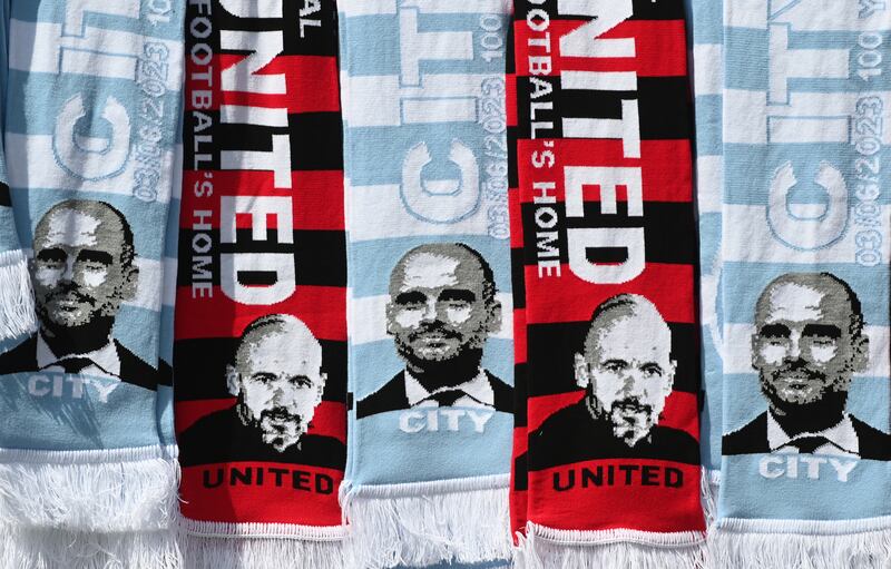 A vendor with City and United merchandise outside Wembley ahead of the FA Cup final on Saturday. EPA