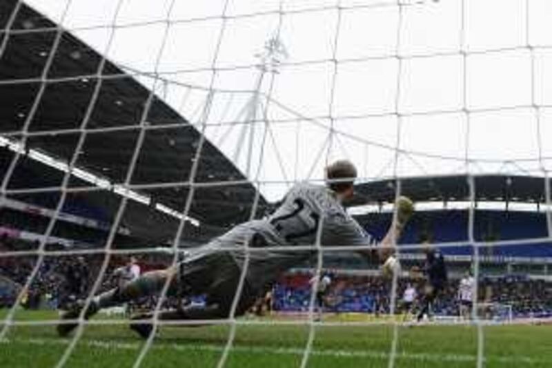 BOLTON, ENGLAND - FEBRUARY 14:  Jussi Jaaskelainen of Bolton Wanderers saves the penalty kick of Tom Huddlestone of Tottenham Hotspur during the FA Cup sponsored by E.ON Fifth round match between Bolton Wanderers and Tottenham Hotspur at the Reebok Stadium on February 14, 2010 in Bolton, England.  (Photo by Laurence Griffiths/Getty Images) *** Local Caption ***  GYI0059592235.jpg