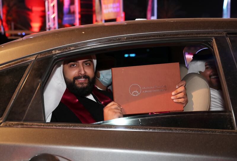 Fares Ali celebrates after collecting his degree certificate