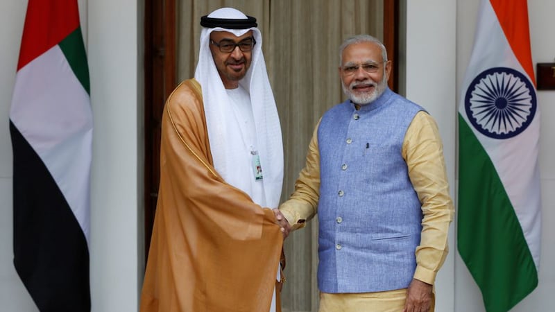 Sheikh Mohamed bin Zayed, Crown Prince of Abu Dhabi and Deputy Supreme Commander of the Armed Forces, greets Indian Prime Minister Narendra Modi at Hyderabad House in New Delhi. Reuters