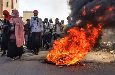 Fires are lit on the streets of Khartoum. AFP
