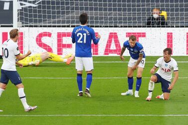 Soccer Football - Premier League - Tottenham Hotspur v Everton - Tottenham Hotspur Stadium, London, Britain - July 6, 2020 Tottenham Hotspur's Giovani Lo Celso celebrates with Harry Kane after Everton's Michael Keane scored an own goal and their first goal, as play resumes behind closed doors following the outbreak of the coronavirus disease (COVID-19) Catherine Ivill/Pool via REUTERS EDITORIAL USE ONLY. No use with unauthorized audio, video, data, fixture lists, club/league logos or "live" services. Online in-match use limited to 75 images, no video emulation. No use in betting, games or single club/league/player publications. Please contact your account representative for further details.