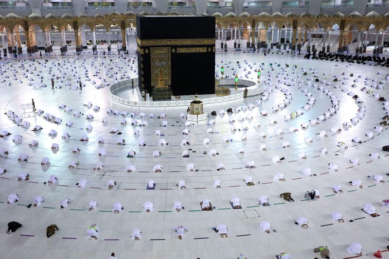 Worshippers perform taraweeh prayers during Ramadan around the Kaaba in the Grand Mosque in Makkah, Saudi Arabia. AFP