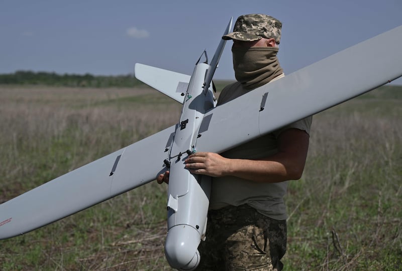 A Ukrainian serviceman prepares to fly a reconnaissance drone near Chasiv Yar, Donetsk region. AFP