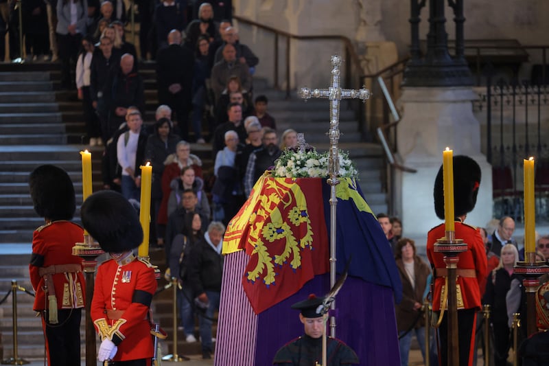 People queue to pay their respects to Queen Elizabeth II at Westminster Hall in London. Reuters