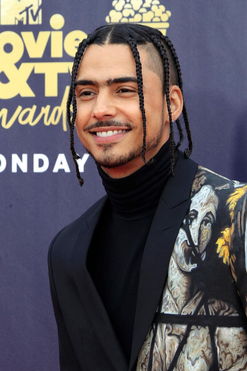 HIT
Singer and actor Quincy Brown chose Michael Cinco for this striking two-toned suit. Half covered in images taken from medieval stained-glass windows, Brown cleverly keep his accessories simple, and let the suit do the talking. EPA