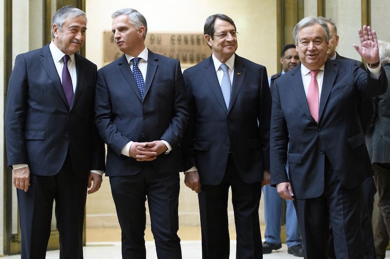 From left, Turkish Cypriot leader Mustafa Akinci, Swiss minister of foreign affairs Didier Burkhalter, Greek Cypriot president Nicos Anastasiades, and UN Secretary-General Antonio Guterres, on the sideline of the Cyprus peace talks at the European headquarters of the United Nations in Geneva, Switzerland, on January 12, 2017. Laurent Gillieron/Pool Photo via AP