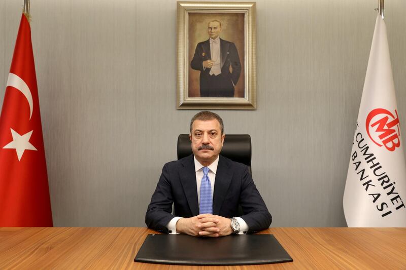 FILE PHOTO: Turkey's new Central Bank Governor Sahap Kavcioglu sits at his office in Ankara, Turkey March 21, 2021. Turkish Central Bank/Handout via REUTERS ATTENTION EDITORS - THIS PICTURE WAS PROVIDED BY A THIRD PARTY. NO RESALES. NO ARCHIVE./File Photo