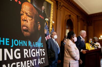A poster of voting rights champion John Lewis after the House of Representatives passed the John Lewis Voting Rights Advancement Act in Washington. AP