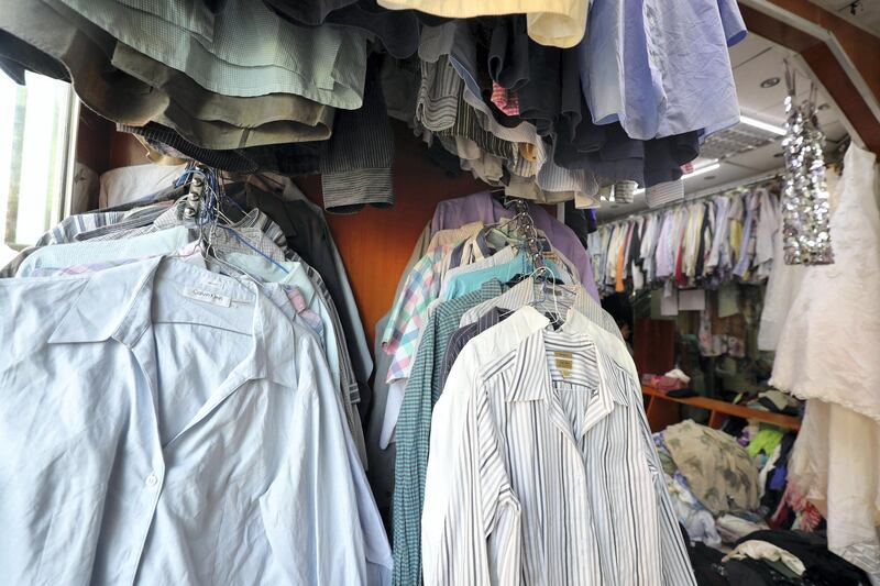 Abu Dhabi, United Arab Emirates - June 19, 2019: Thrift clothes shop Jamal Kamal ready made garments shop. Wednesday the 19th of June 2019. Hamdan Bin Mohammed Street, Abu Dhabi. Chris Whiteoak / The National