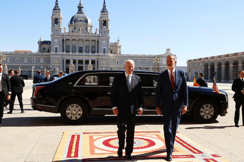 Mr Biden, left, and King Felipe arrive for a meeting at the Royal Palace in Madrid. Reuters