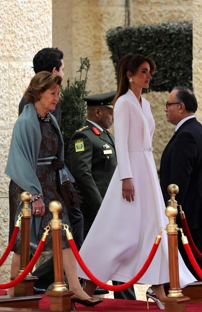 Jordan's Queen Rania walks with Norway's Queen Sonja upon her arrival at the Royal Palace in Amman, Jordan March 2, 2020. REUTERS/Muhammad Hamed