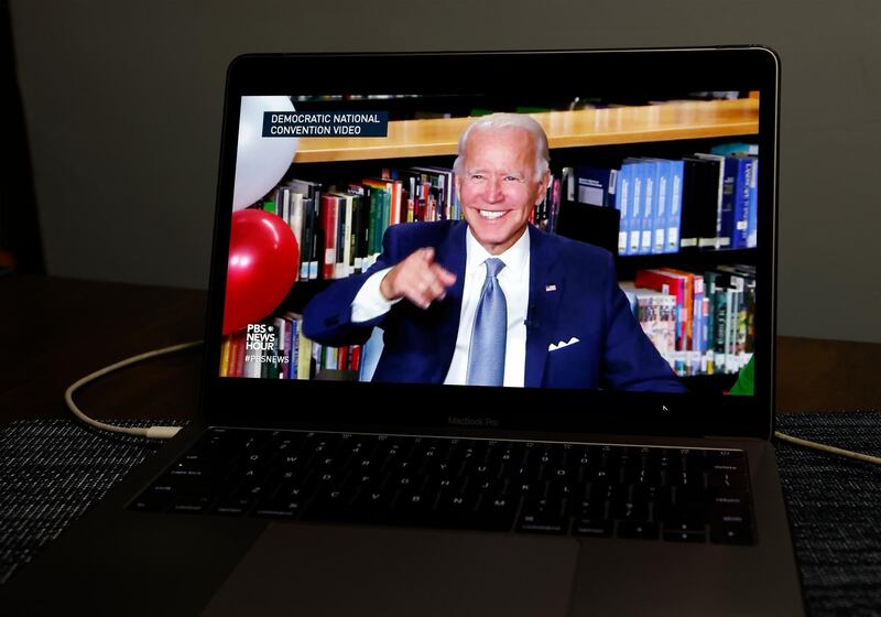 Democratic Presidential nominee Joe Biden is displayed on a computer as he speaks during the virtual Democratic National Convention, in New York City, USA.  EPA