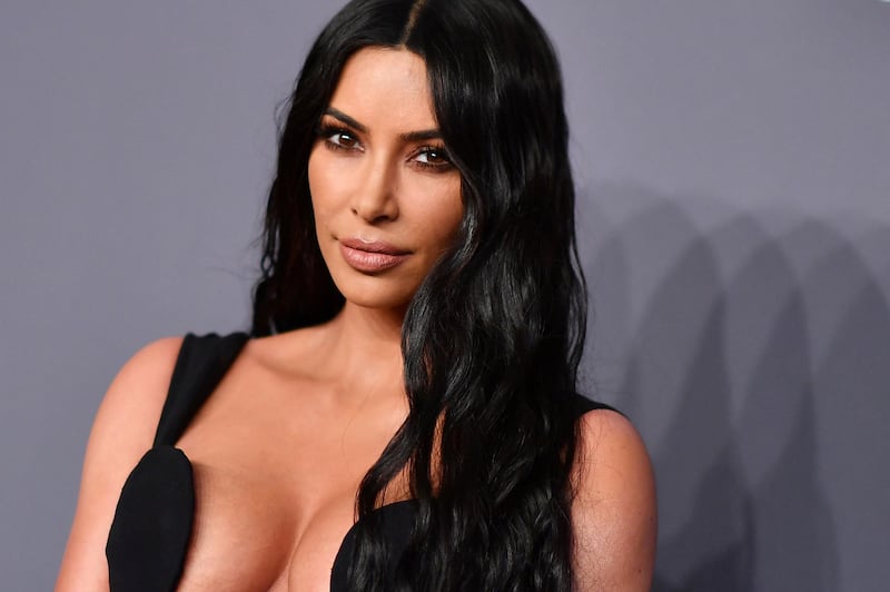 (FILES) In this file photo taken on February 6, 2019, US media personality Kim Kardashian West arrives to attend the amfAR Gala in New York. Kim Kardashian found herself caught up in an unlikely international art smuggling row on May 4, 2021 involving an ancient Roman sculpture that was imported to California under her name. / AFP / ANGELA  WEISS
