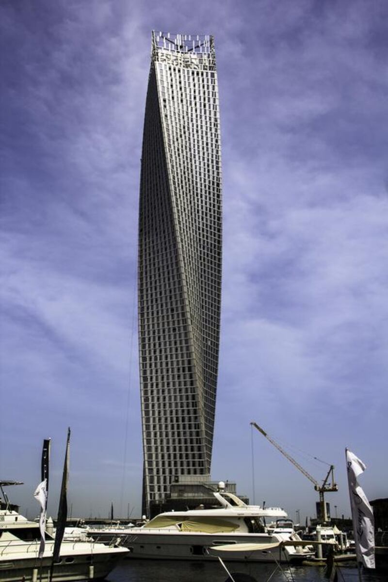 Cayan Tower, which took seven years to build, rotates through 90 degrees up to a height of 310 metres. Alan Millin