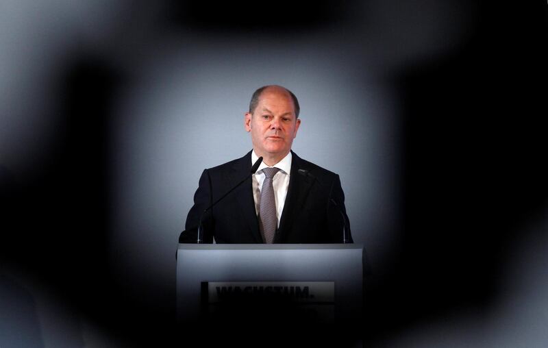 German finance minister Olaf Scholz speaks during the '70 Years of Social Market Economy' anniversary event at the Federal Ministry for Economic Affairs and Energy in Berlin. Michele Tantussi / Reuters