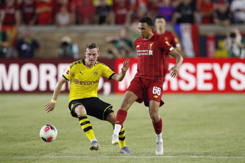 Trent Alexander-Arnold battles for the ball for Liverpool. AFP